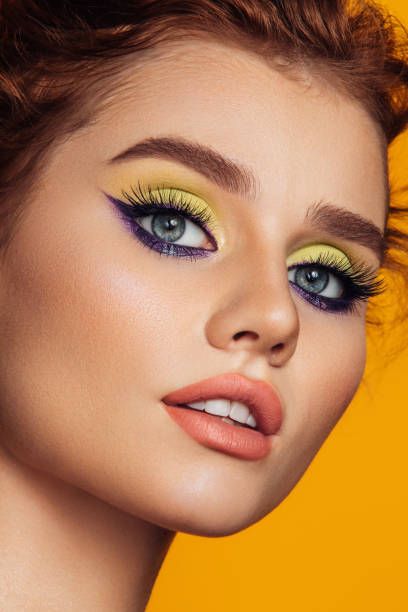 istock Beautiful woman with bright make-up 1354953559