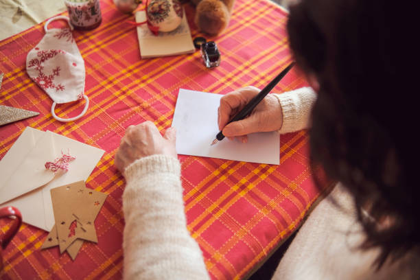 istock Christmas activity for seniors - writing letters 1354954503