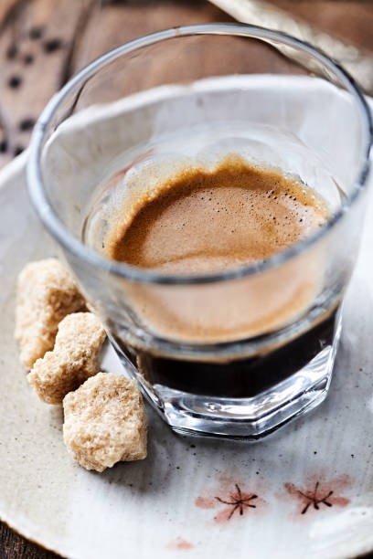 istock Coffee in glass cup. Close up. 1354955086