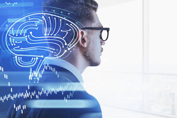 istock Businessman wearing suit and glasses is watching at panoramic window 1354956032