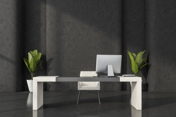 istock Minimalist black and white office desk 1354957632