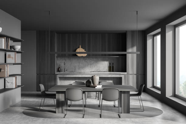 istock Dark kitchen room interior with two barstools, bar counter 1354957658