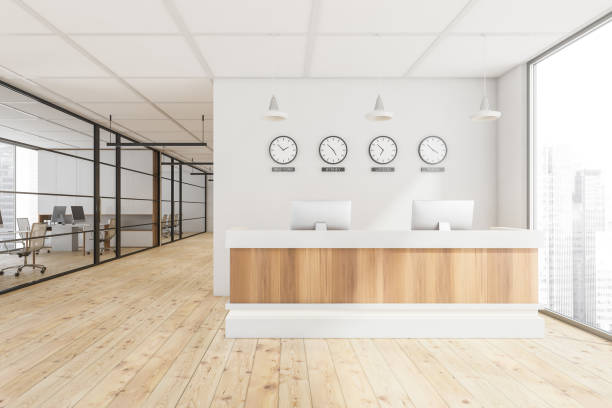istock White and light wood office lobby with a double front desk 1354957887
