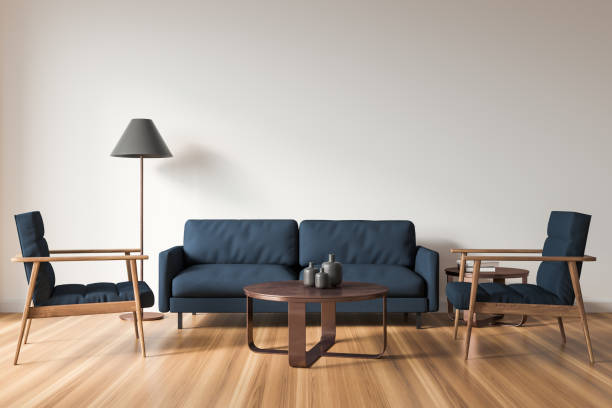 istock Blue sofa in light living room interior with chairs and coffee table, mockup 1354958171
