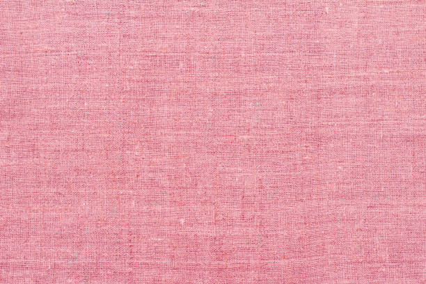 istock Natural linen fabric, background or texture, toned in Pacific Pink 1354959106
