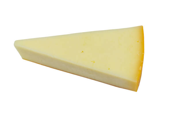 istock Piece of cheese isolated on white background. Top view 1354959406