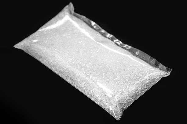 istock Sodium Thiosulfate on isolated black background. Solid and crystalline chemical product used in the pharmaceutical industry and in the analysis of drinking water 1354959606