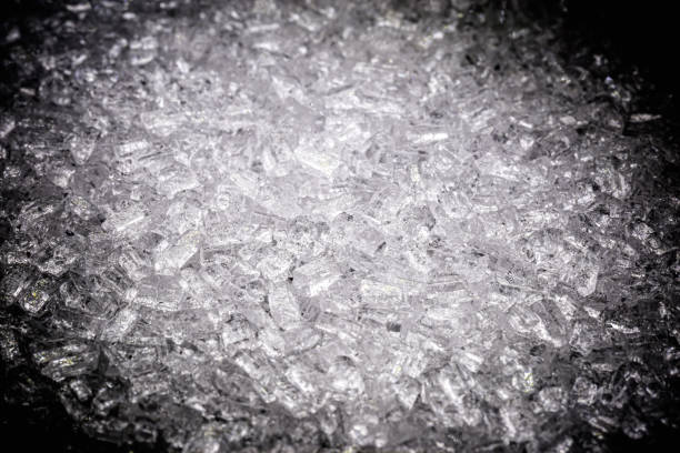 istock Sodium Thiosulfate on isolated black background. Solid and crystalline chemical product used in the pharmaceutical industry and in the analysis of drinking water 1354959614