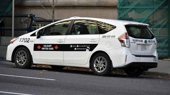 Building Exterior, Calgary United Cabs Land Vehicle Scene During Autumn Season In Calgary Alberta Canada
