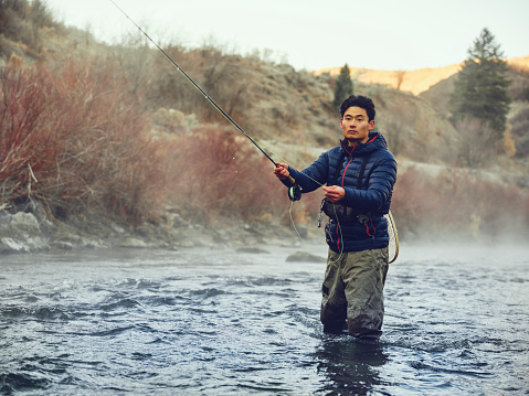 Asian Man on Provo River Fly Fishing in Utah