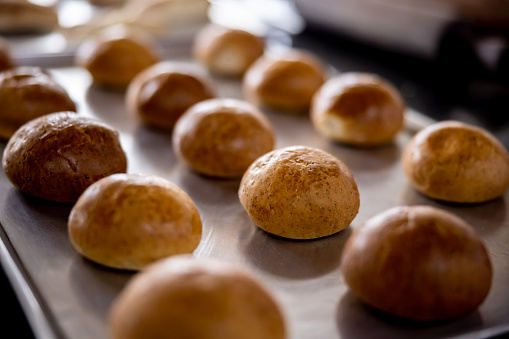Close-up on freshly baked buns at the bakery