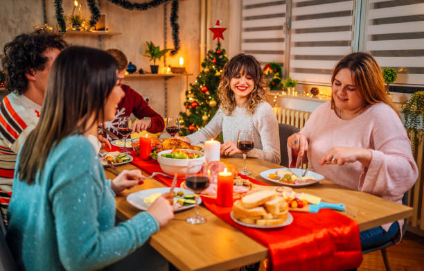 istock Friends celebrating Christmas 1354964947