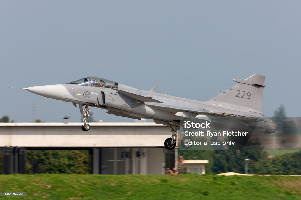 Swedish Air Force Saab Jas39c Gripen Fighter Aircraft On Approach To Land At Payerne Airport Stock Photo - Download Image Now -