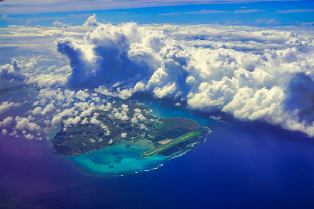 istock small island over the sea from sky with clear sky and cloud 1354970092