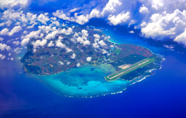 istock small island over the sea from sky with clear sky and cloud 1354970101