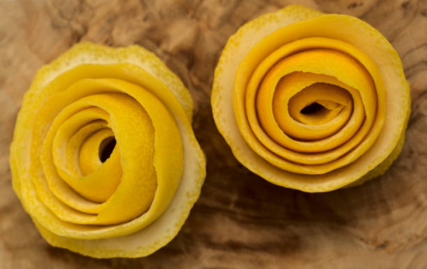 istock Using lemon peel to make potpurri in the shape of roses 1354970125