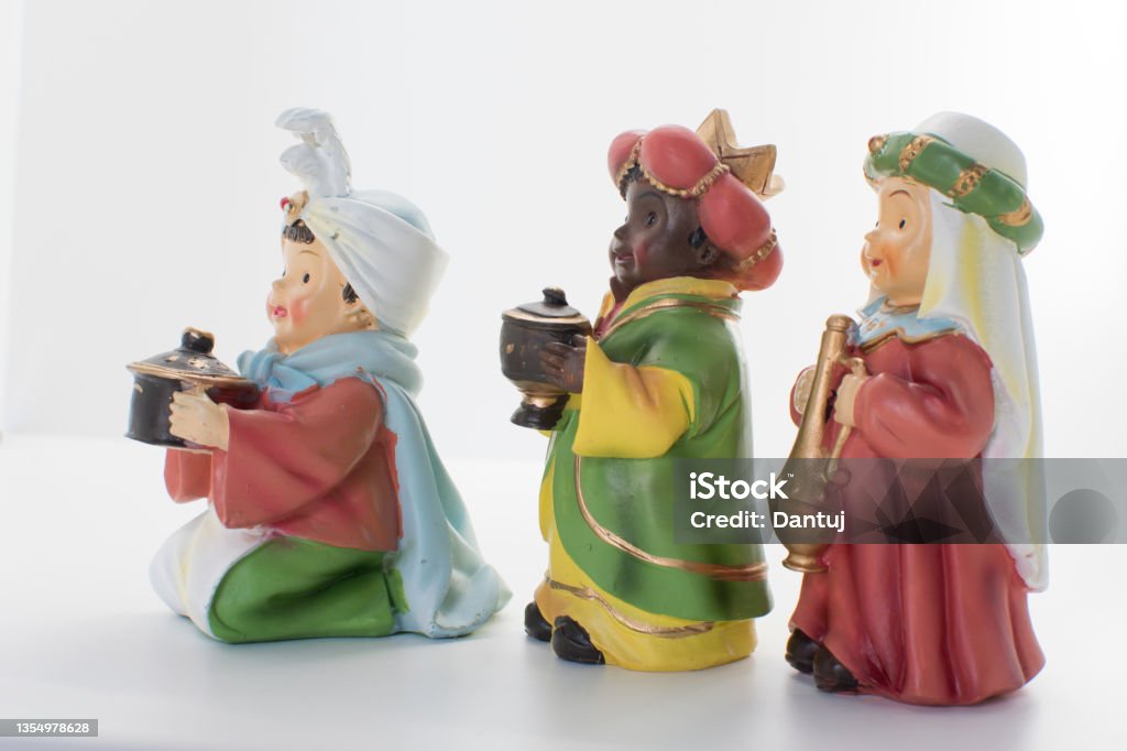 The three Wise Men: Melchior, Gaspar and Baltasar bring gifts to the baby Jesus. Christmas decorative figures isolated on white background Incense Stock Photo