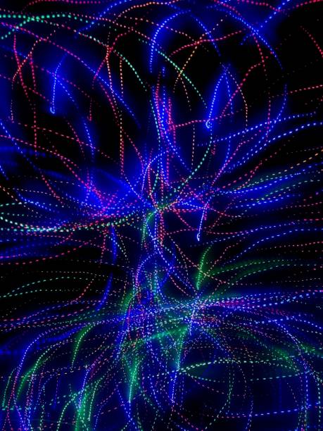 istock colorful lights on a black background 1354985951