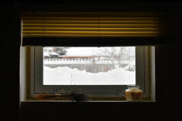 istock Dark and Dreary Basement Window 1354990756