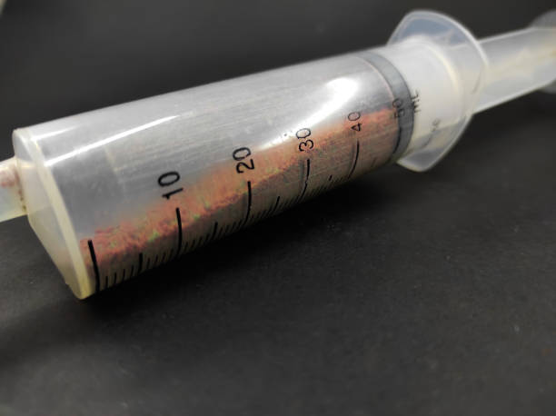 istock Large injection on black - stock photo 1355002630