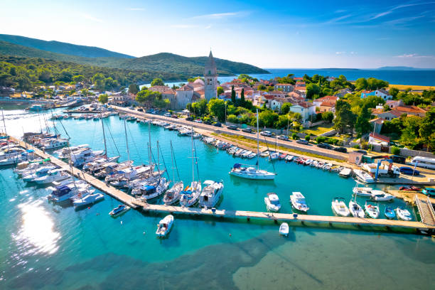 Town of Osor harbor and bridge between Cres and Mali Losinj islands arial view, Town of Osor harbor and bridge between Cres and Mali Losinj islands arial view, Adriatic archpelago of Croatia hvar photos stock pictures, royalty-free photos & images
