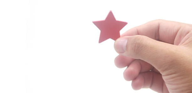 istock Rise on increasing stars in human hand, Increase rating 1355013845