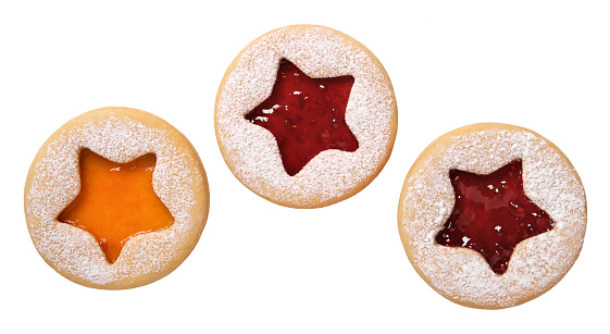 Traditional Christmas Linzer Cookies isolated on white background. Homemad cookies close up.