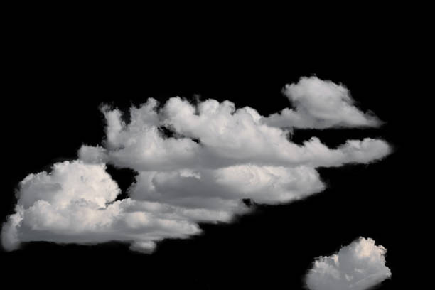 istock white fluffy clouds isolated on a black background, nature 1355017104
