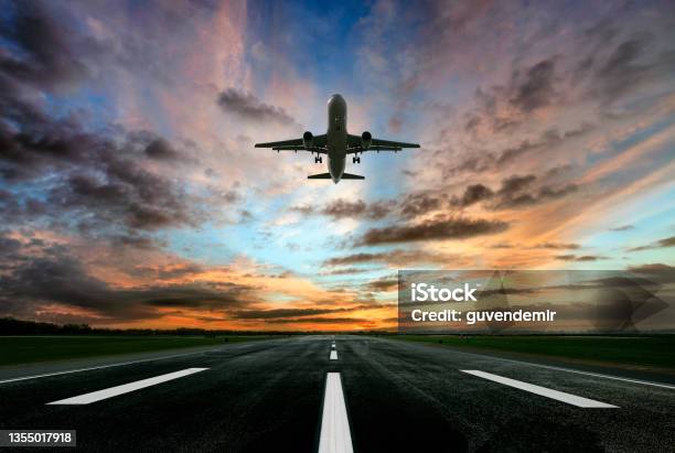 Passenger Airplane Taking Of At Sunrise Stock Photo - Download Image Now - Airplane, Taking Off - Activity, Airport Runway