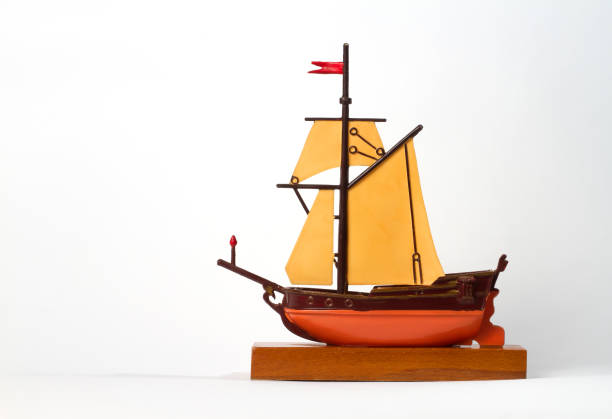 sailboat marine made of walnut isolated on white background
