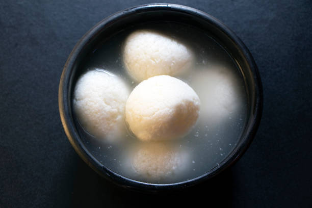 Indian Sweet Rasgulla Also Know as Rosogolla, Roshogolla, Rasagola, Ras Gulla is a Syrupy Dessert Popular in India. Indian Sweet Rasgulla Also Know as Rosogolla, Roshogolla, Rasagola, Ras Gulla is a Syrupy Dessert Popular in India. rosogolla stock pictures, royalty-free photos & images