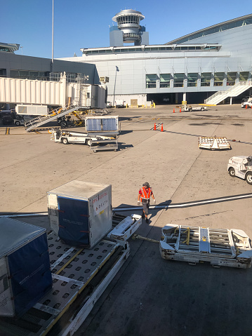 Las Vegas, USA - Sep 30, 2019: A Delta cargo container being loaded on a departing jet at the Las Vegas Airport late in the day.