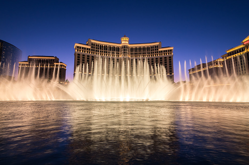 Las Vegas, USA - Sep 21, 2019: The free Bellagio water show at twilight on the Strip.