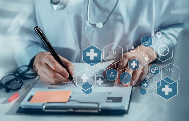 istock Doctor medical and working. 1355029596