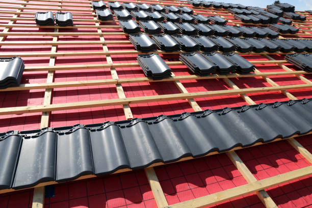 istock Roofing work, new covering of a tiled roof 1355031277