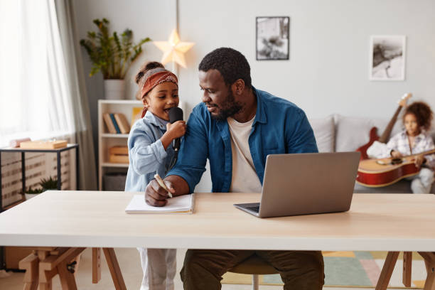 istock African American Father Working from Home 1355035167