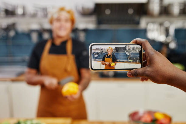 istock Filming Cooking Video 1355035479