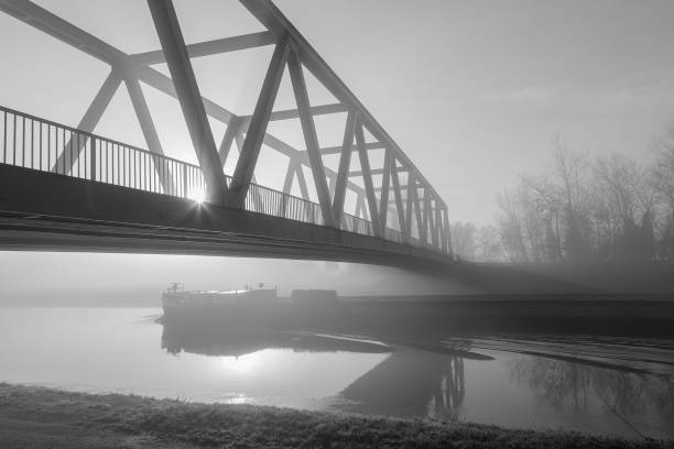 istock a bridge in the fog 1355036692
