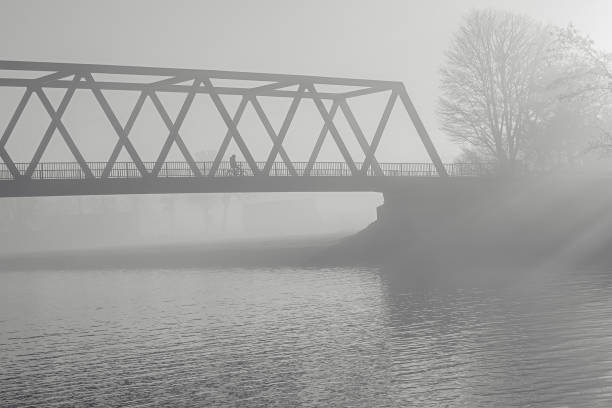 istock a bridge in the fog 1355036709
