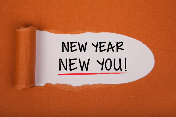 istock Torn Paper With New Year New You On White Background 1355037022