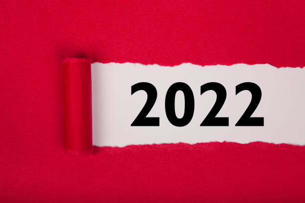 istock Torn Paper With Happy New Year 2022 On White Background 1355037787