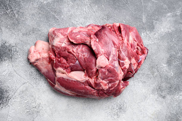 istock Fresh raw mutton shoulder meat, on gray stone table background, top view flat lay, with copy space for text 1355040361