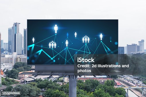 istock Glowing Social media icons on road billboard over panoramic city view of Kuala Lumpur, Malaysia, Asia. The concept of networking and establishing new connections between people and businesses in KL. 1355040566
