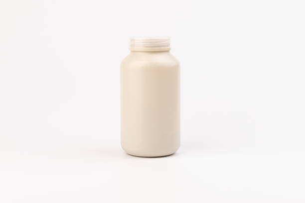 istock Pills jar. Medical container for drugs, diet, nutritional supplements. 1355045689