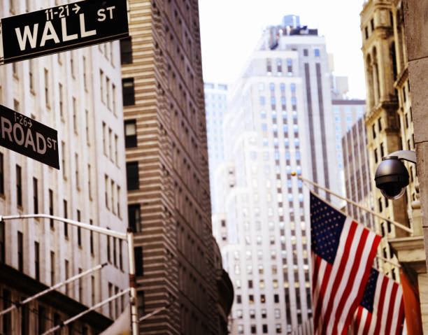 istock Wall Street road sign, NYC. 1355049115