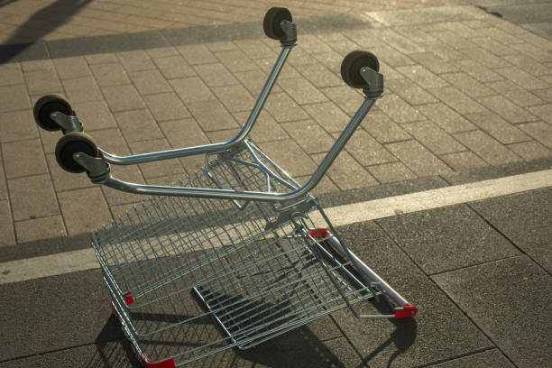Trolley supermarket. Empty shopping trolley cart at supermarket parking lot. Sale buy mall market shop consumer concept