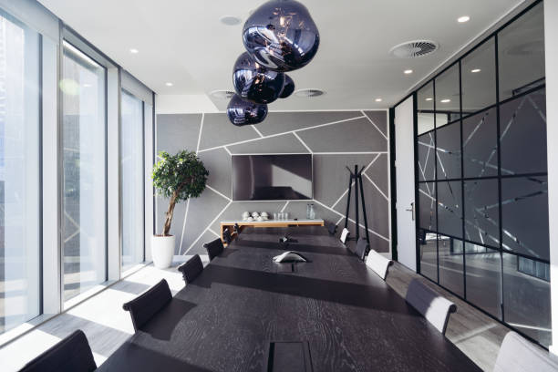 istock Expansive board room with sunny city view 1355051087