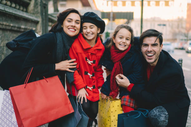 istock Family on Christmas shopping 1355053482