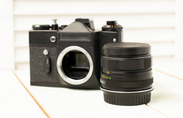 istock Old retro camera with heart love photography creative concept 1355054331