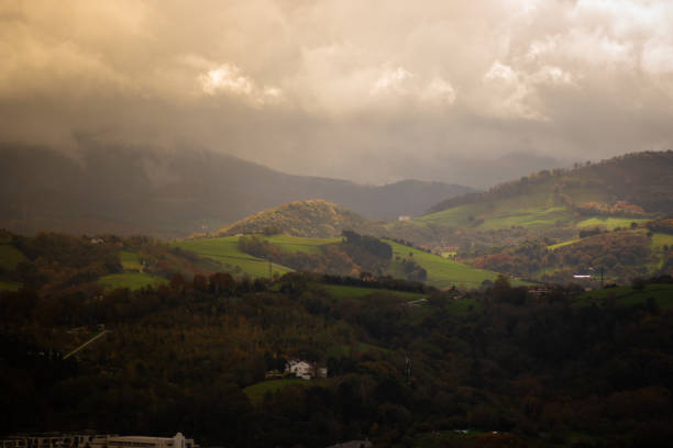 istock A sunlight through the clouds in the countryside 1355055955